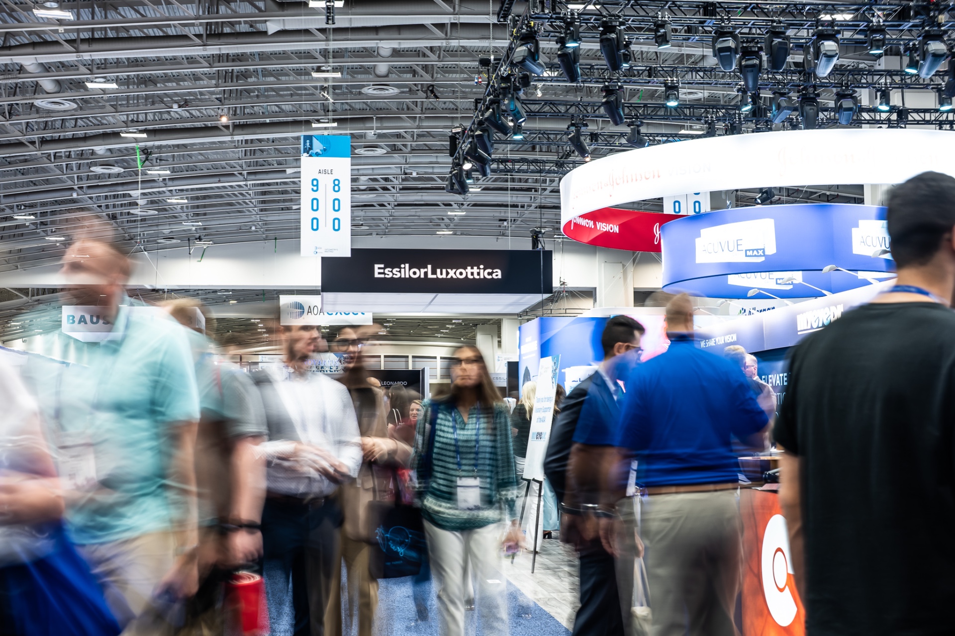 Trade show floor photography - EssilorLuxottica booth motion blur