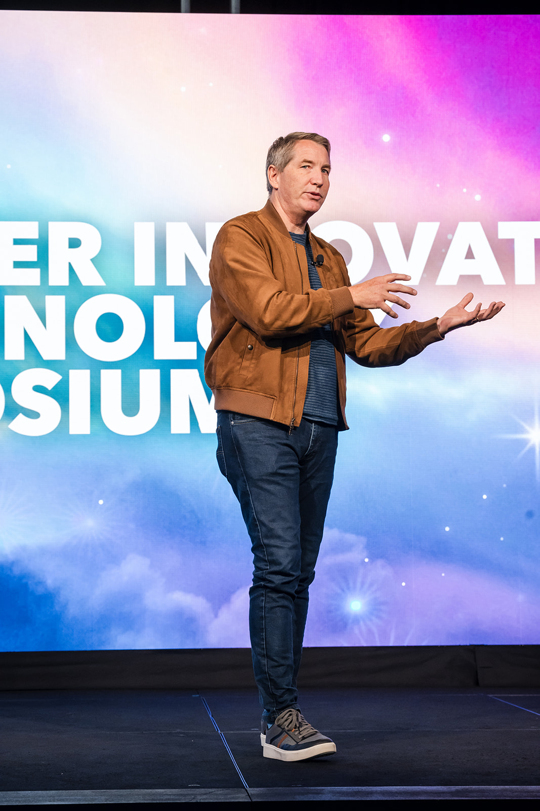 Leidos symposium keynote speaker on stage - LITS event