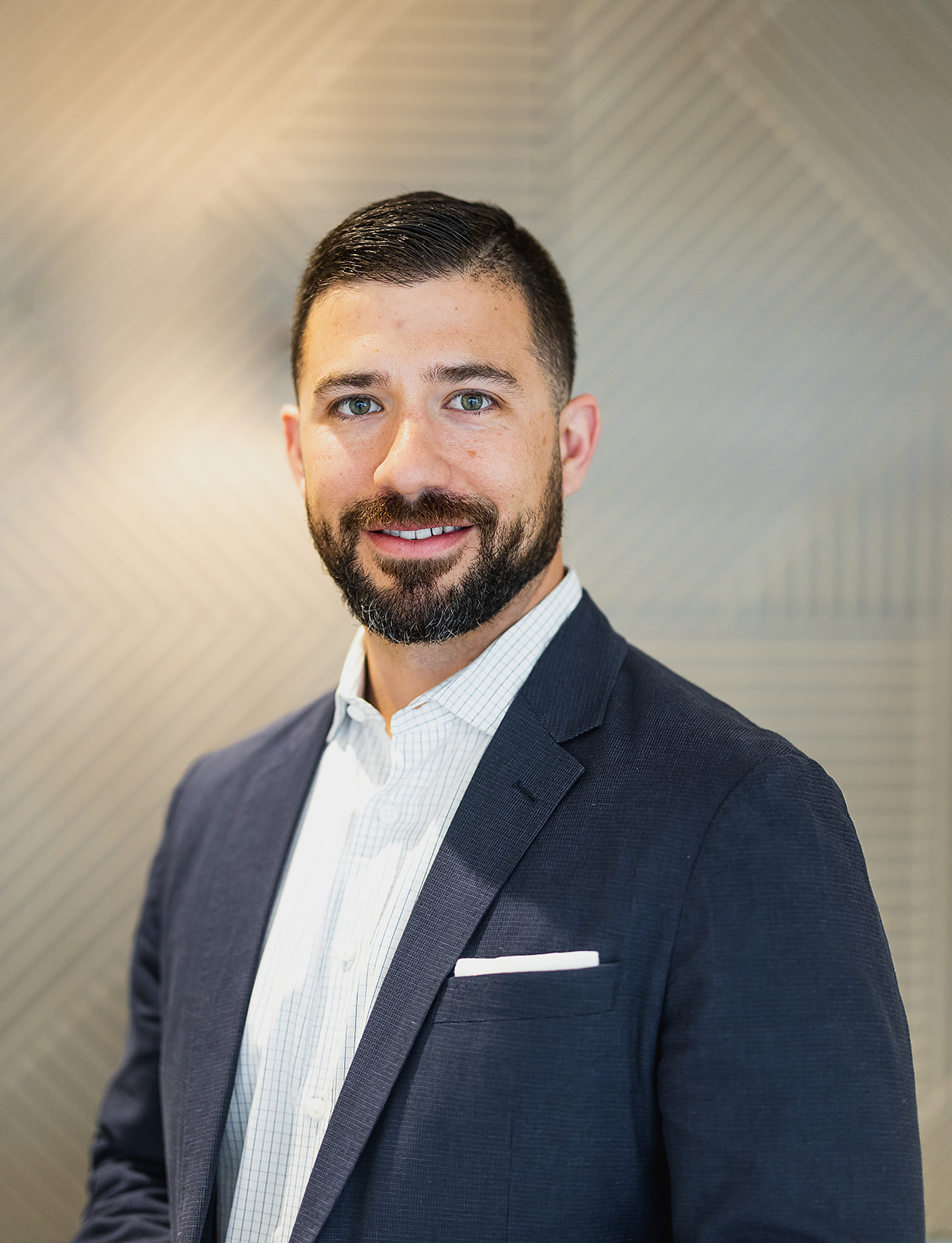 FedTech conference executive headshot - navy blazer portrait