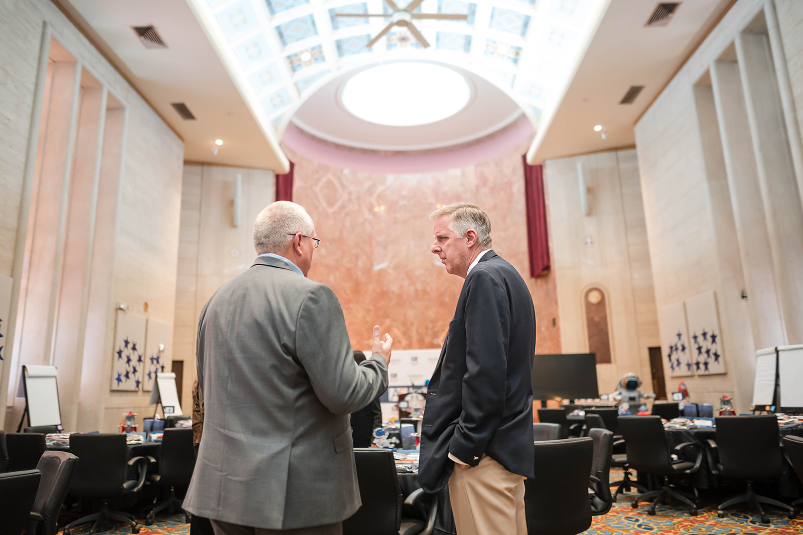 Academic Search conference - executives conversing grand ballroom