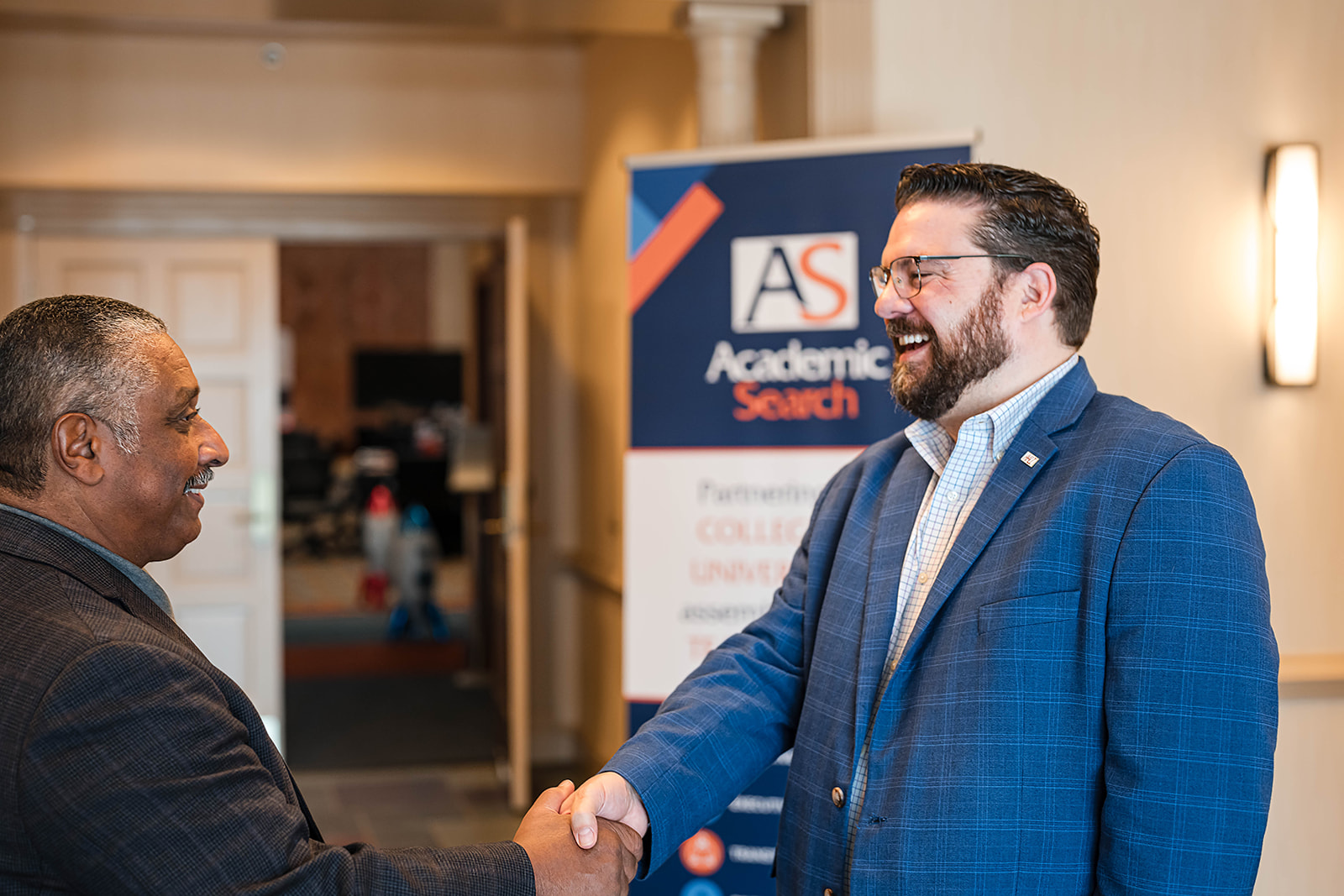 Academic Search conference handshake - networking event photography