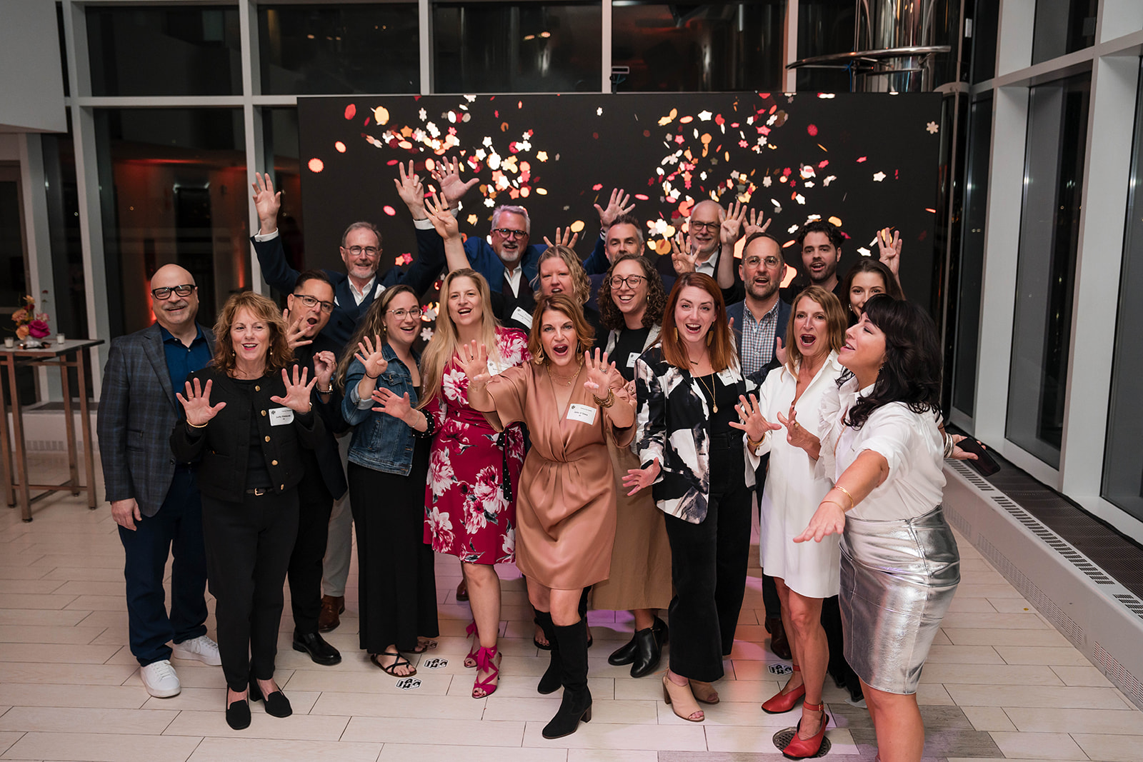 IA Interior Architects group photo - confetti celebration